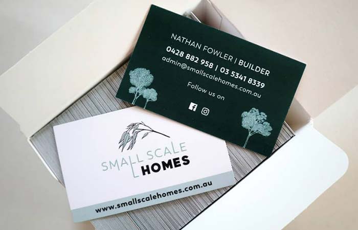 Small scale homes business card design featuring illustrations